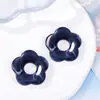 Halo de flor hueca de cinco pétalos acrílico medio agujero accesorios de flor pendientes hechos a mano DIY accesorios para el cabello colgante materiales de joyería