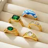 Anillo Estilo Retro Simple Transfronterizo Europeo y Americano Electrochapado al Vacío en Oro de 18K Incrustado con Circonitas de Colores y Esmalte de Porcelana Azul y Blanca
