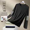 Camiseta casual versátil de manga larga para hombre para otoño, cuello redondo, color liso moderno, cómoda, transpirable y de corte holgado.