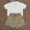Roupa Infantil Estilo Coreano 2026 Verão Novo Conjunto Elegante de Duas Peças: Camiseta de Malha Fina com Gola Reversível e Shorts Casuais para Meninos e Meninas