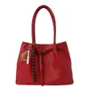 Bolso tejido versátil, estilo nicho coreano, bolso de mano de alta calidad para el trabajo y el día a día, bolso para mujer, bolso de hombro de gran capacidad, bolso de axila