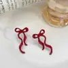Nuevos aretes de lazo de cinta transfronterizos, aretes simétricos de moda, aretes del mismo estilo más vendidos en Amazon, venta al por mayor del fabricante