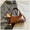 Bolsa de Hombro Única de Alta Calidad Estilo Coreano de Moda Tendencia Primavera 2026 para Mujer Bolso de Mano Casual Simple