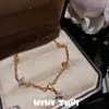 Pulsera de Flor de Calabaza de Hielo Dorada con Filigrana Antigua Nuevo Estilo Chino Diamante Candado de Seguridad Conjunto de Collar