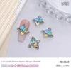 Accesorios para uñas Reina Madre Super Brillantes universo tamaño pequeño Corazón Torcido Diamante lujo ligero aleación tridimensional plata accesorios para uñas al por mayor