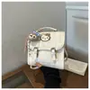 2026 Nueva Moda Trendy Linda Juvenil Bolso de Cuadros Mochila de Gran Capacidad para Viajes Diarios con Colgante para Mujeres