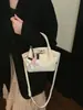 Bolso de Mujer Transfronterizo 2026 Nueva Temporada Primavera/Verano con Acabado de Alta Gama, Moderno y Súper Popular, Gran Capacidad, Bolso Cubo de Hombro y Cruzado a la Moda