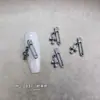 Accesorios para arte de uñas de aleación con forma de cruz gótica oscura transfronterizos, pendientes vintage europeos y americanos, accesorios de pedrería para uñas estilo punk gótico