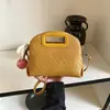 Bolsas de palha tecidas à mão para mulheres 2026 nova coleção primavera e verão bolsas de palha nicho super populares bolsa de ombro única bolsa de axila bolsa de balde transpassada