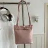Bolso de cubo popular estilo coreano de este año para mujer, nuevo modelo de verano 2026, bolso de hombro patchwork de color liso, bolso de axila para el trabajo