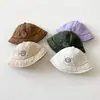 Corea del Sur mismo estilo cara sonriente simple bordada sombrero de pescador para niños sombrero de sol versátil para bebé sombrero de cubo de ala ancha