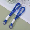 Cordão de celular em macaron de duas camadas color block com corda trançada na cor dopamina, acessório para chave e celular, pulseira de pulso anti-perda