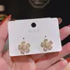 Brincos de florzinha pequenos simples e fofos de Dongdaemun, Coreia do Sul, personalidade feminina, temperamento, moda simples, brincos Joker, atacado