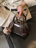 Bolsa Feminina Exquisita e Moderna 2026 Nova Moda Versátil Bolsa de Ombro para Trabalho e Deslocamento Bolsa de Mão Pequena Simples Bolsa Transversal