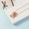 Nuevo Collar de Atrapasueños Proyección Hoja Hueca 100 Idiomas Clavícula Versátil Moda