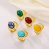 Anillo de estilo retro europeo y americano con piedra natural, acero inoxidable, chapado en oro de 18 quilates, con borde cruzado y turquesa, abierto.