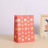 Nueva bolsa de papel kraft impresa de moda, pequeña, fresca, bolsa tote de margarita pequeña, bolsa de embalaje para regalo de niños al por mayor