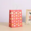 Bolsa de regalo creativa serie girasol regalo a mano papel kraft bolsa de regalo portátil bolsa de flor pequeña en stock