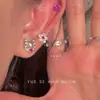 Perforación de Oreja Pequeña Flor Brillante de Diamante Completo Clavo de Hueso de Oreja Pendientes para Mujer 2025 Pendientes Nuevos Diseño de Nicho