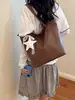Bolso de mujer con textura estilo western, nuevo y moderno bolso tote de gran capacidad primavera-verano 2026, bolso de hombro casual a la moda para el día a día
