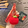 Lindo llavero de coche de caqui tejido a crochet de lana para mujer, pareja, bolso, colgante de caqui, exquisito regalo pequeño, venta al por mayor