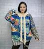 Pelo de imitación de visón Otoño e Invierno Nuevo Camiseta base gruesa de punto con capucha Suéter holgado Estilo perezoso Top de manga larga con perforaciones calientes para mujer