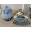 Sombrero de cubo de paja de papel con hilo mixto y tejido de malla hueca estilo coreano, transpirable para el verano, con colores contrastantes, diseñado para hacer que la cara parezca más pequeña y proporcionar cobertura facial, adecuado para vacaciones