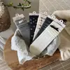 Serie Gris de Alta Inteligencia Songmu: Calcetines grises sofisticados y discretos para mujer con lazo estilo ins y diseño apilado