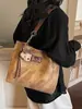Bolsa de Gran Capacidad Yuezi para Mujer 2026 Primavera Nuevo Estilo Bolsa para Clase de Estudiante Universitario Moda Bolso Tote de Hombro para Viajes