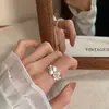 Anillo de flor de gardenia coreana, suave y elegante, anillo abierto para dedo índice, color plateado, anillo versátil para mujer, sensación de alta gama