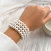 Collar francés de diamantes en forma de corazón con cuentas apiladas, elegante collar de perlas de imitación multicapa con forma de arroz, joyería transfronteriza europea y americana para mujer.