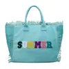 Bolso de lona con letra y borla minimalista para comercio exterior, bolso de mano de gran capacidad, nuevo bolso tote de hombro de color liso para uso transfronterizo