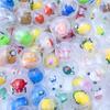 Máquina de gashapon de alta gama de 75 mm, mano de gashapon translúcida de 45 mm, pelota de juguete de regalo de gashapon de 100 mm, venta al por mayor
