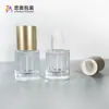 Botella Redonda Gruesa de 30 ml para Esencia y Loción al por Mayor en Stock con Cabezal de Bomba de Presión para Dispensar Aislante y Protector Solar, Tipo Pulsador