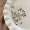 Explosiones Diamante de cristal para uñas de 5 mm Decoraciones para uñas de mariposa Nuevo taladro de fondo puntiagudo rojo neto Diamantes de imitación de color mágico transparente