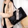 Bolso de gran capacidad para mujer 2025 nueva moda diseño nicho bolso de hombro textura versátil clase commuter bolso tote