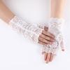 Guantes cortos de encaje de medio dedo con dedos abiertos y sin dedos para mujer, con protección solar para conducir.