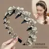 Tiara Franzida com Babados para Mulheres 2026 Novo Estilo High-End Fashionável com Dentes e Pegada Antiderrapante