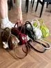 Bolsa de Mão Pequena Feminina Shuai Mi Jia 2026 Verão Nova Nicho Retro Bolsa de Ombro Moda para o Trabalho Bolsa Transversal