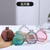 Botella de Aromaterapia sin Fuego Personalizada al por Mayor Transfronteriza Botella de Vidrio 100 ml/150 ml Diffusor Chanel Transparente de Colores
