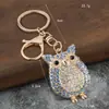 Colgante de Bolso Creativo Exclusivo Transfronterizo Búho de Dibujos Animados Incrustado de Diamantes Llavero de Metal Fabricante Venta al por Mayor Pequeños Regalos