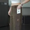 Calça de trabalho masculina de marca da moda, nova para primavera e outono, com múltiplos bolsos, estilo americano, perna reta, calça casual, calça de moletom versátil de corte solto