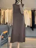 Vestido de otoño e invierno nuevo, de cuello redondo, de ganchillo, con bolsillos, sin mangas, apilado, suelto, informal, de viajero diario, de lana completa, chaleco de punto para mujer