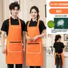 Delantal impermeable con estampado de logo, adecuado para cajeros de supermercado y tiendas de conveniencia, con bolsillo y cremallera, y diseñado como uniforme de trabajo para la industria de la restauración, específicamente para mujeres