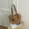 Bolso de mano minimalista para mujer, tejido a mano en paja, gran capacidad, adecuado para vacaciones y fotografía, versátil y del mismo estilo