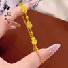 Pulsera de Calabaza Grabada con Láser de Alta Retención de Color, Moneda, Mariposa, Mismo Estilo que Tienda de Oro, Dorado Arena Trébol de Cuatro Hojas Deslumbrante Pulsera de Caballo al por Mayor