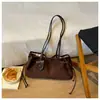 Bolso de hombro vintage de terciopelo transfronterizo para mujer, nuevo diseño de nicho coreano, bolso de axila, bolsa de mano versátil para el trabajo, moderno