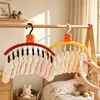 Colgador multi-clip con forma de caqui para ropa de bebé, tendedero y organizador para ropa interior y calcetines de uso doméstico