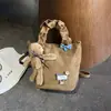Bolsa de ombro retrô estampada de leopardo da moda para mulheres, novo estilo 2026, grande capacidade, simples e versátil, adequada para o dia a dia e pode ser carregada sob o braço