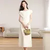 Elegante vestido color albaricoque sin hombros para mujer, nuevo estilo verano 2026, cintura ceñida, manga corta, vestido largo intelectual y sencillo